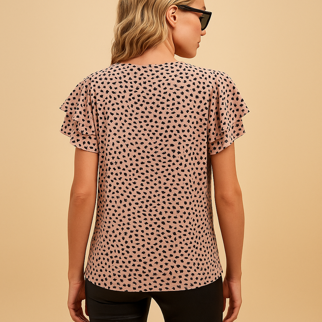 Women’s bold print flowy top with flattering fit and elegant design, suitable for casual outings, dinner dates, and smart casual wear.