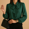 Women’s bow tie neck blouse with loose flattering fit and breathable fabric, ideal for office wear and casual chic outfits.