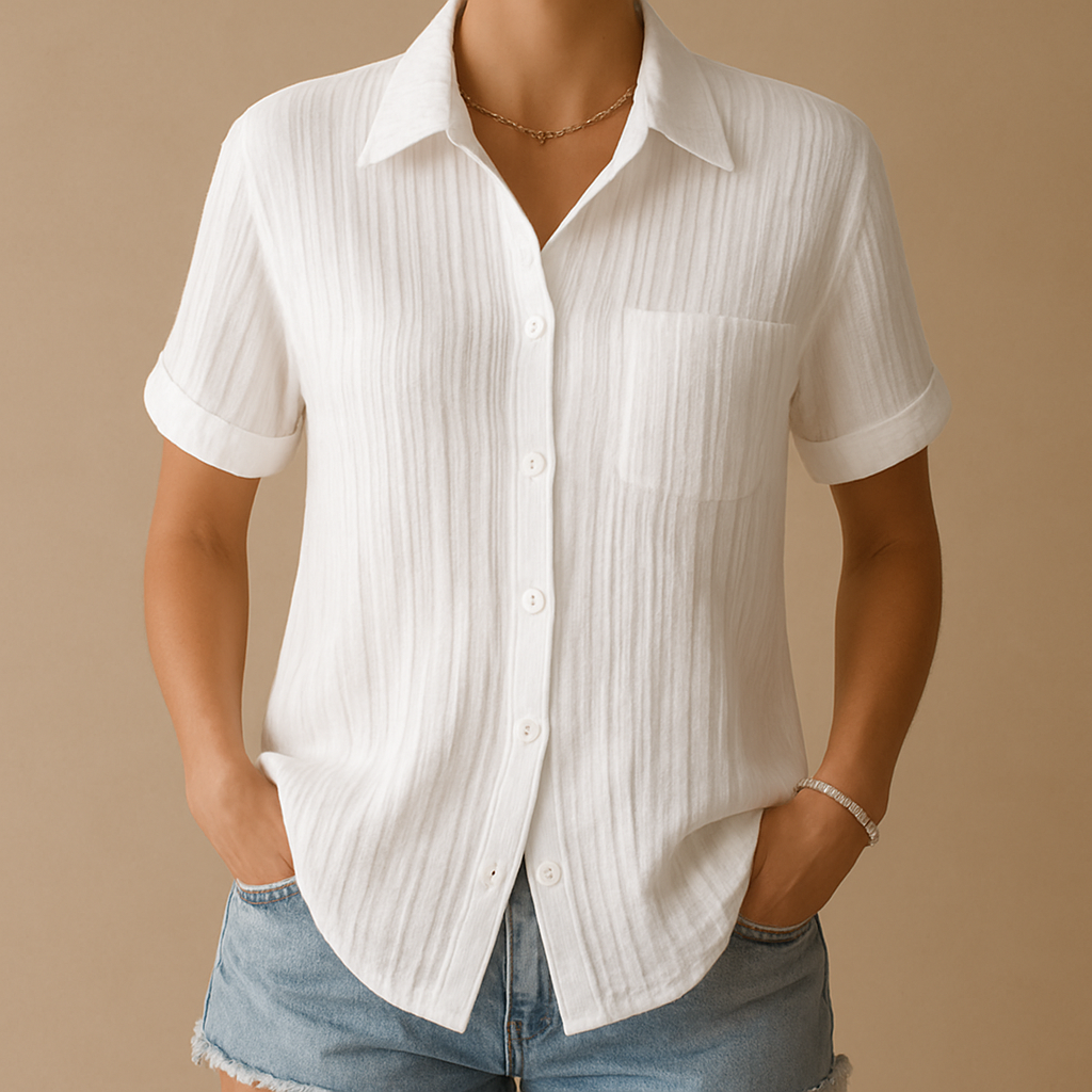 Classic short sleeve blouse for women in white with relaxed fit and chest pocket, ideal for office wear, casual outfits and warm days.