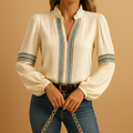 Elegant lace lantern sleeve blouse for women with loose fit and delicate patchwork, ideal for work, evening outings and casual occasions.