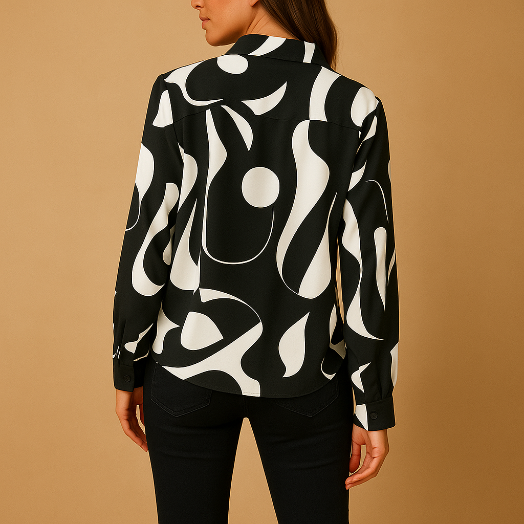 Elegant printed blouse for women in apricot and black with a smooth comfortable fit, ideal for office wear, casual outfits and formal occasions.