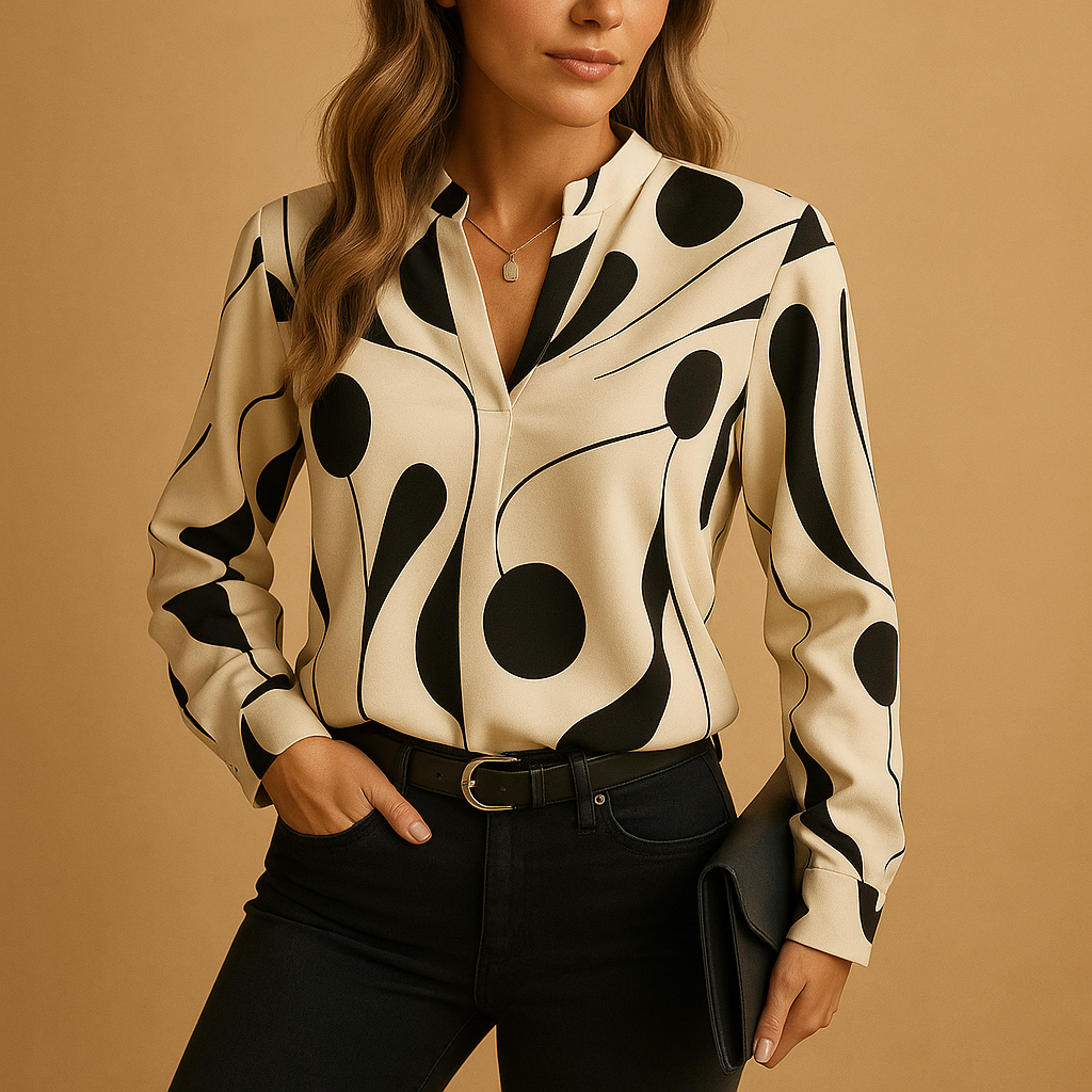 Elegant printed blouse for women in apricot and black with a smooth comfortable fit, ideal for office wear, casual outfits and formal occasions.