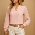 Women’s elegant V-neck blouse with flowing fit and soft fabric, suitable for office wear, casual outfits, and all-season styling.