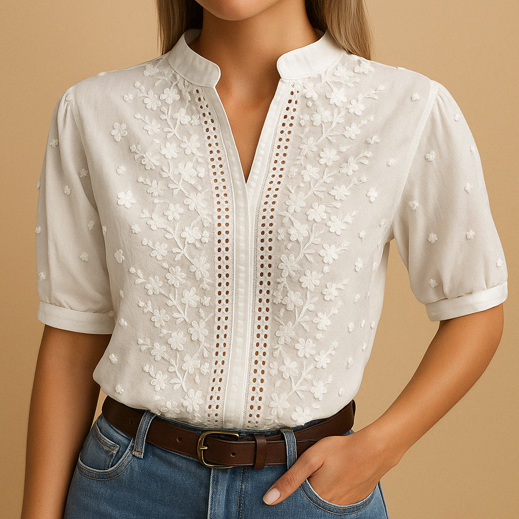 Elegant white blouse for women with a classic collar and button closure, suitable for work, leisure, and evening occasions.