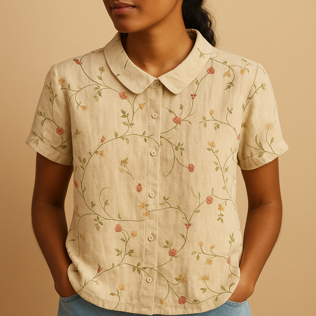 Floral print airy blouse for women with loose comfortable fit and multicolor flower pattern, perfect for casual summer days and outdoor wear.