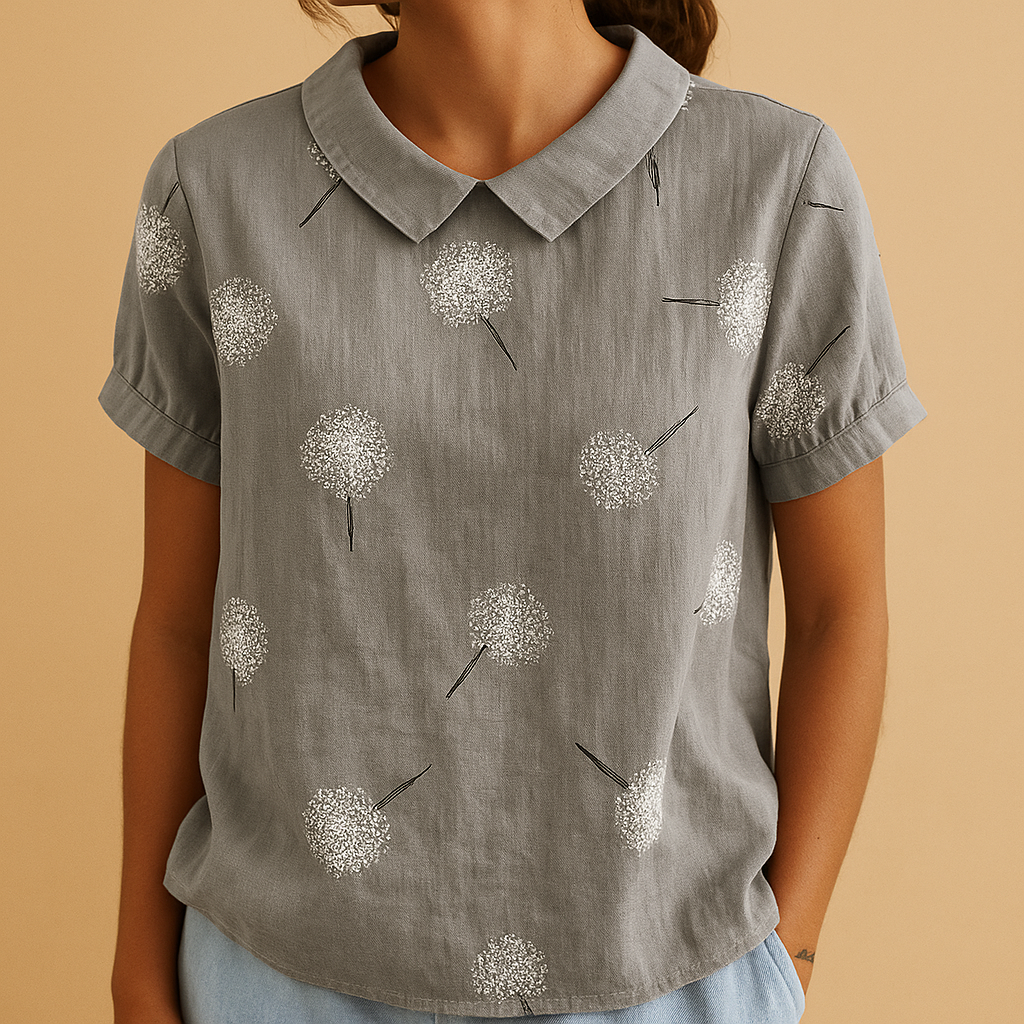 Floral print airy blouse for women with loose comfortable fit and multicolor flower pattern, perfect for casual summer days and outdoor wear.
