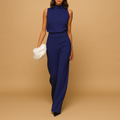 High waist wide leg halter jumpsuit for women with decorative bow and pockets, suitable for parties, dinners, and evening occasions.