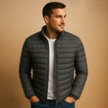 Men’s hooded puffer jacket with classic design, warm insulation, and comfortable fit, suitable for winter days and outdoor use.