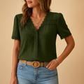 Women’s lace V-neck blouse with intricate lace details and flattering fit, suitable for office wear, evening outings, and special occasions.