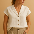 Women’s lightweight summer blouse with round neckline and button closure, perfect for beach trips, vacations, and casual warm weather outfits.