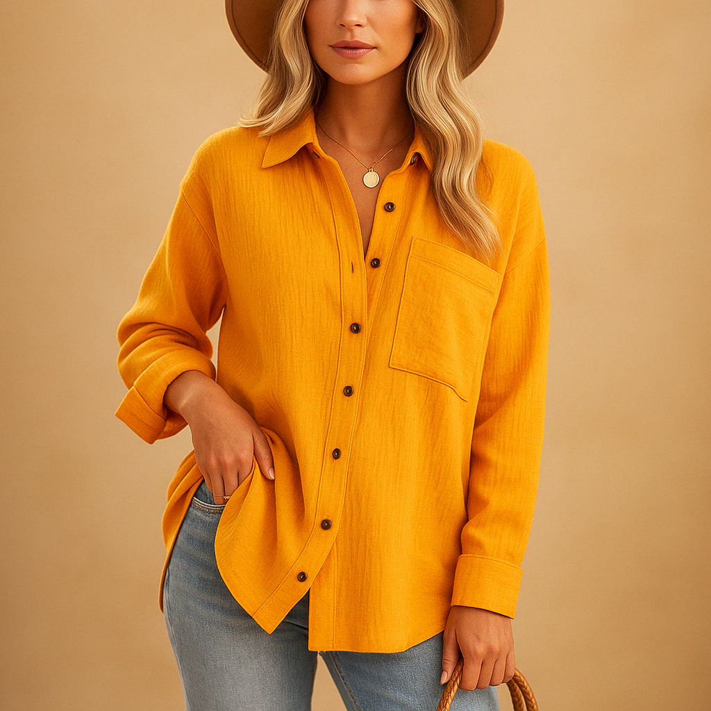 Women’s long sleeve polo shirt with classic collar, button closure and chest pocket, ideal for office wear and casual outfits.