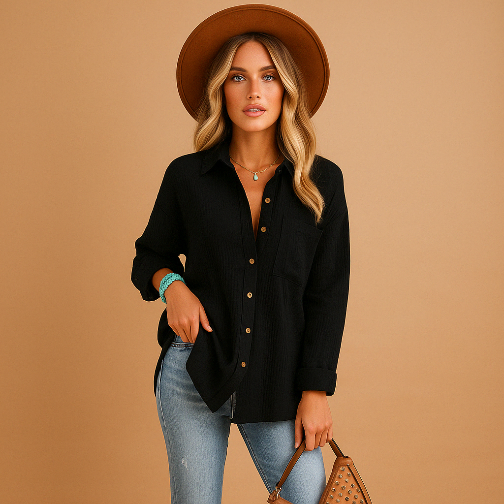 Women’s long sleeve polo shirt with classic collar, button closure and chest pocket, ideal for office wear and casual outfits.