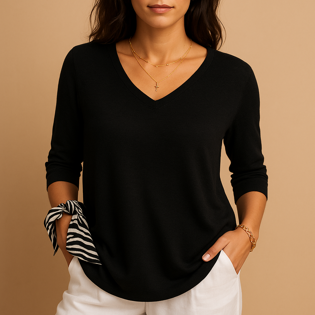 Women’s luxury loose fit top with soft fabric and modern relaxed silhouette, ideal for casual wear and everyday comfort.