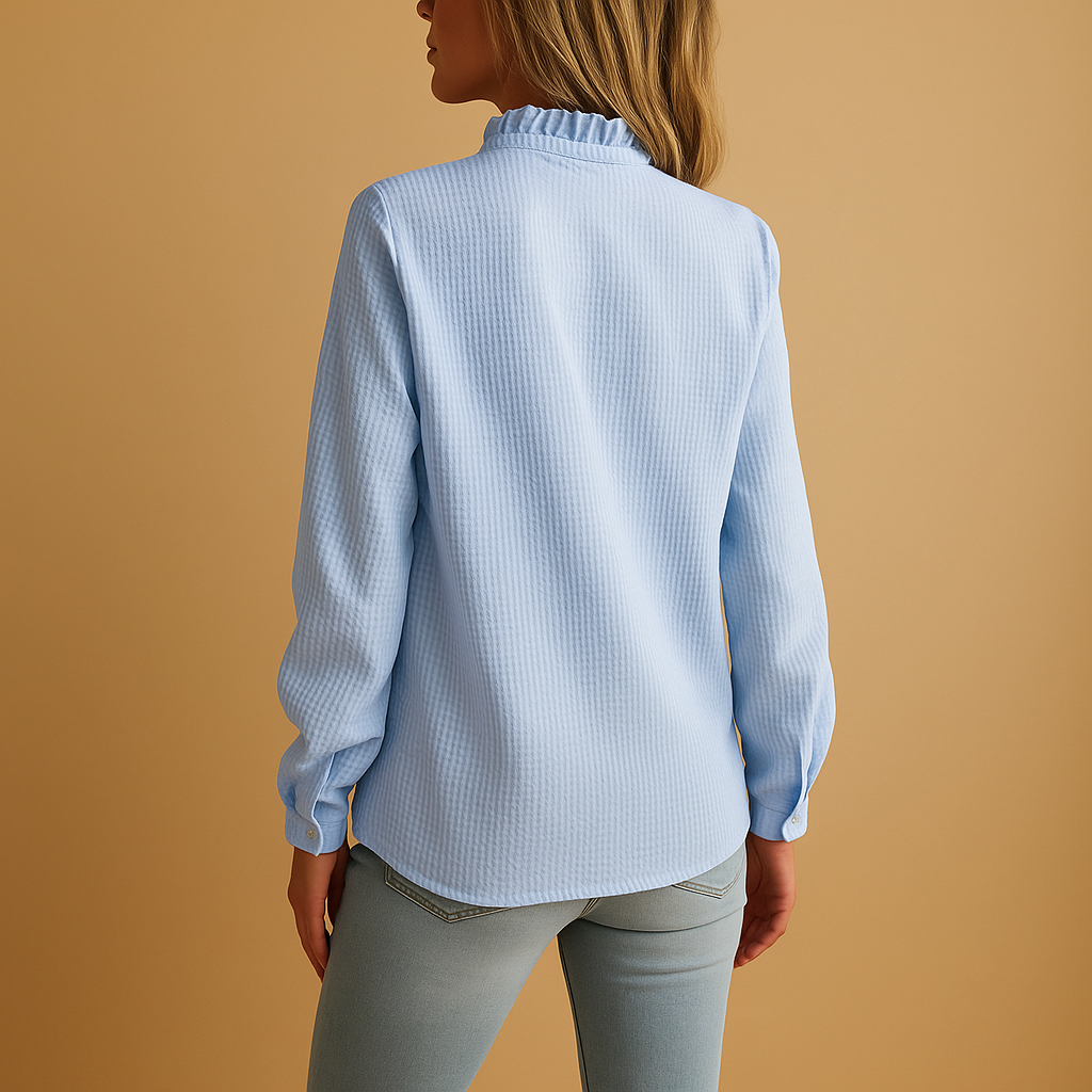 Striped ruffle blouse for women in black, white, pink and blue with feminine fit, perfect for office wear, casual outfits and semi-formal occasions.