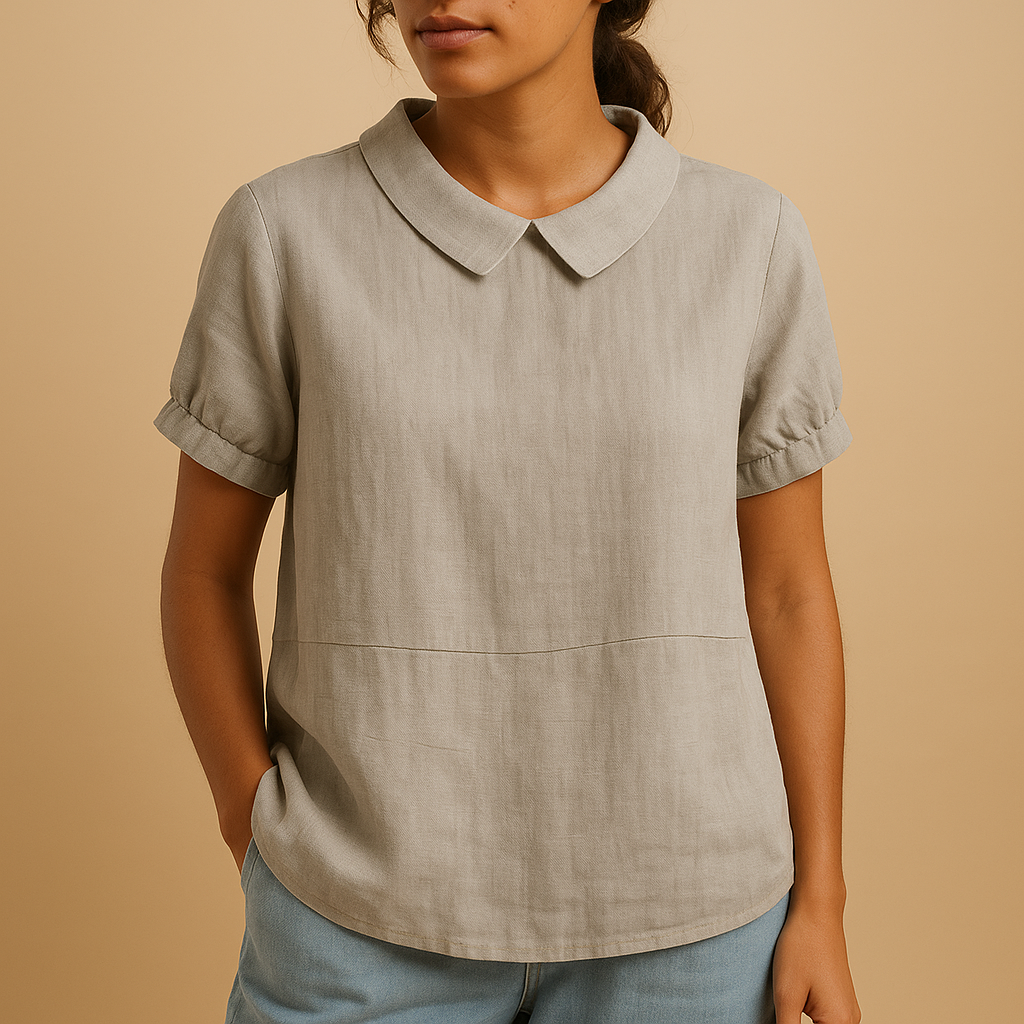 Women’s tailored elegant blouse with a classic design and refined fit, suitable for office outfits, formal meetings, and smart casual looks.