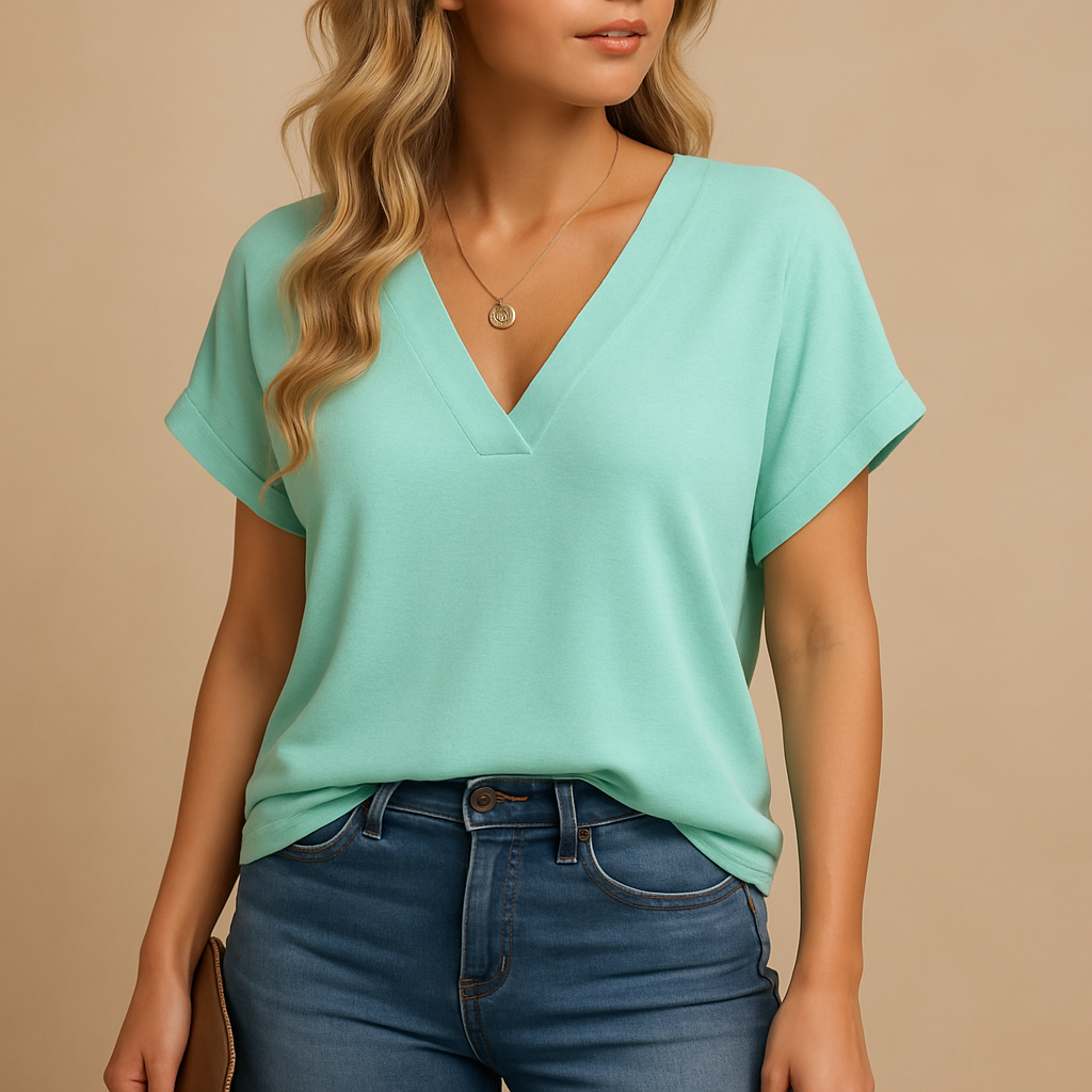 V-neck puff sleeve blouse for women in pink, grey, black, blue and sea green, featuring a flattering fit and lightweight fabric for work or casual wear.